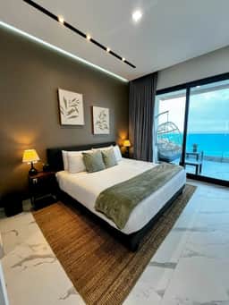 Beachfront 2BR w/ Rooftop Pool | Encantame Soleil