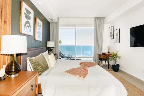 Beachfront Encantame 2BR · Heated Rooftop Pool - Image 1